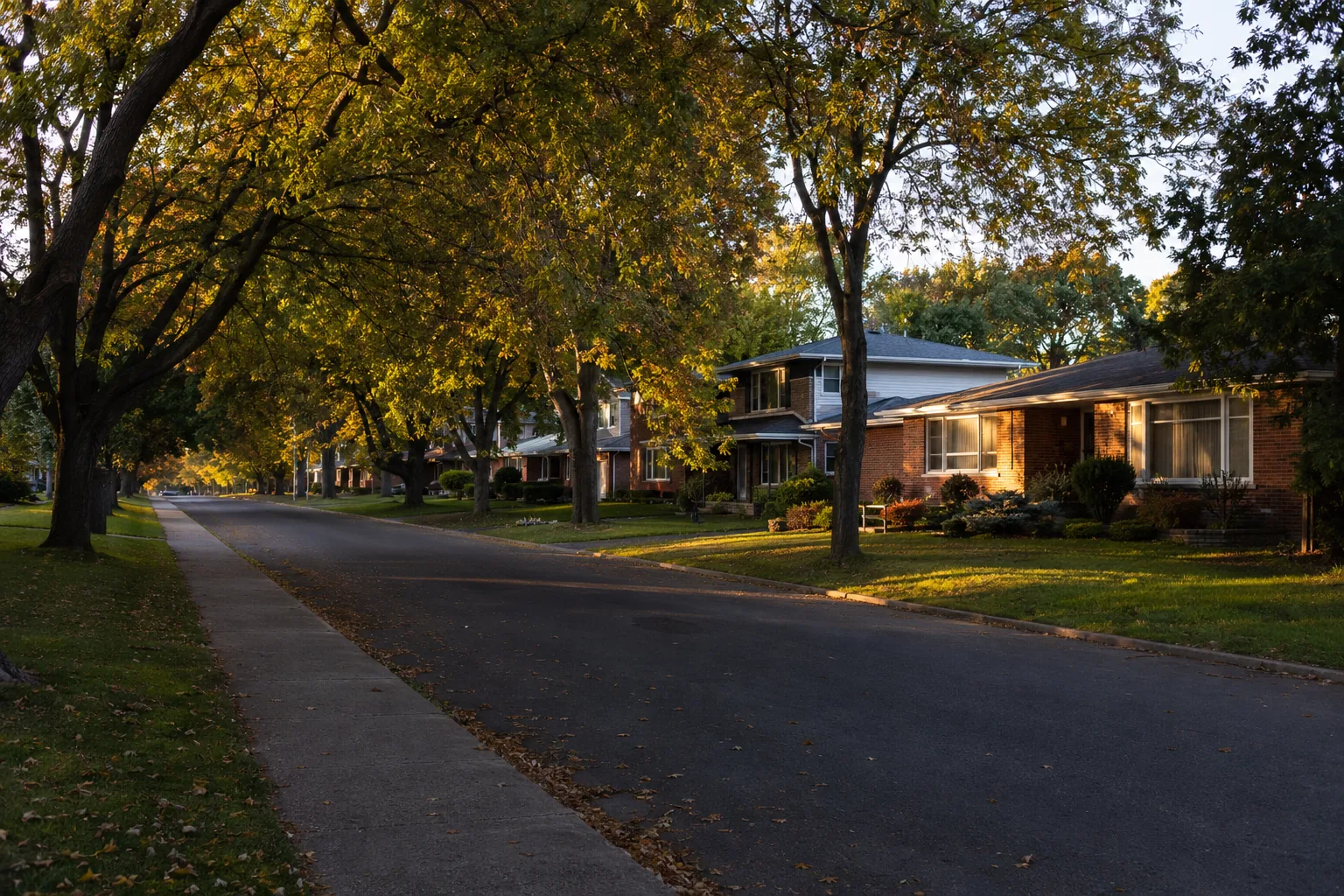 A tree-lined Nepean street of 1960s brick bungalows, the kind of west Ottawa home a local mortgage agent finances